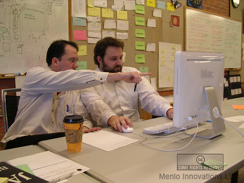 photo: two programmers pairing locally